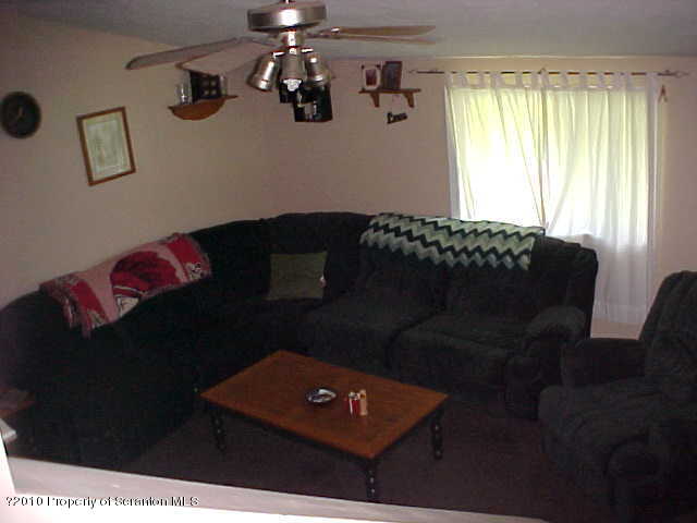 40 Orchard Road Great Bend, PA 18821 - Photo 5 of 8 a living room with a couch