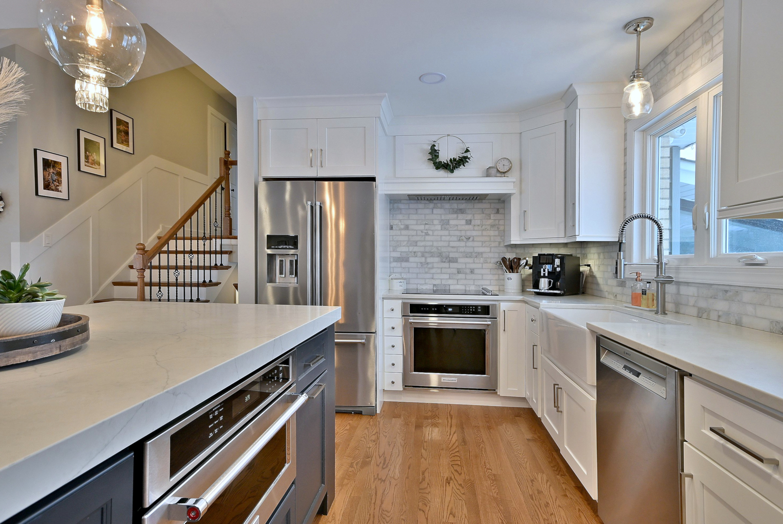 366 Marion Street Elmhurst, IL 60126 - Photo 12 of 41 a kitchen with stainless steel appliances sink stove microwave and cabinets
