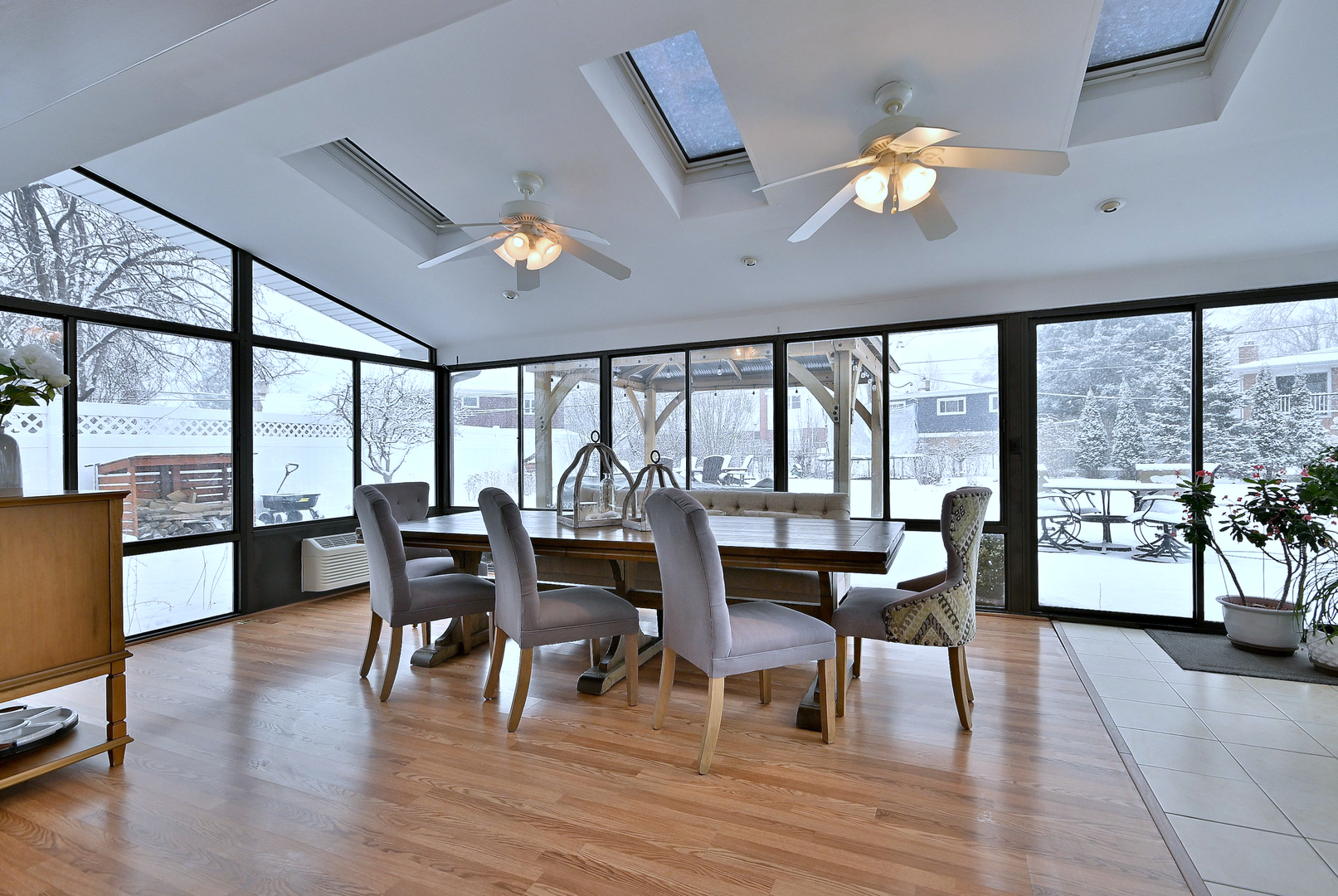 366 Marion Street Elmhurst, IL 60126 - Photo 24 of 41 a view of a dining room with furniture and wooden floor