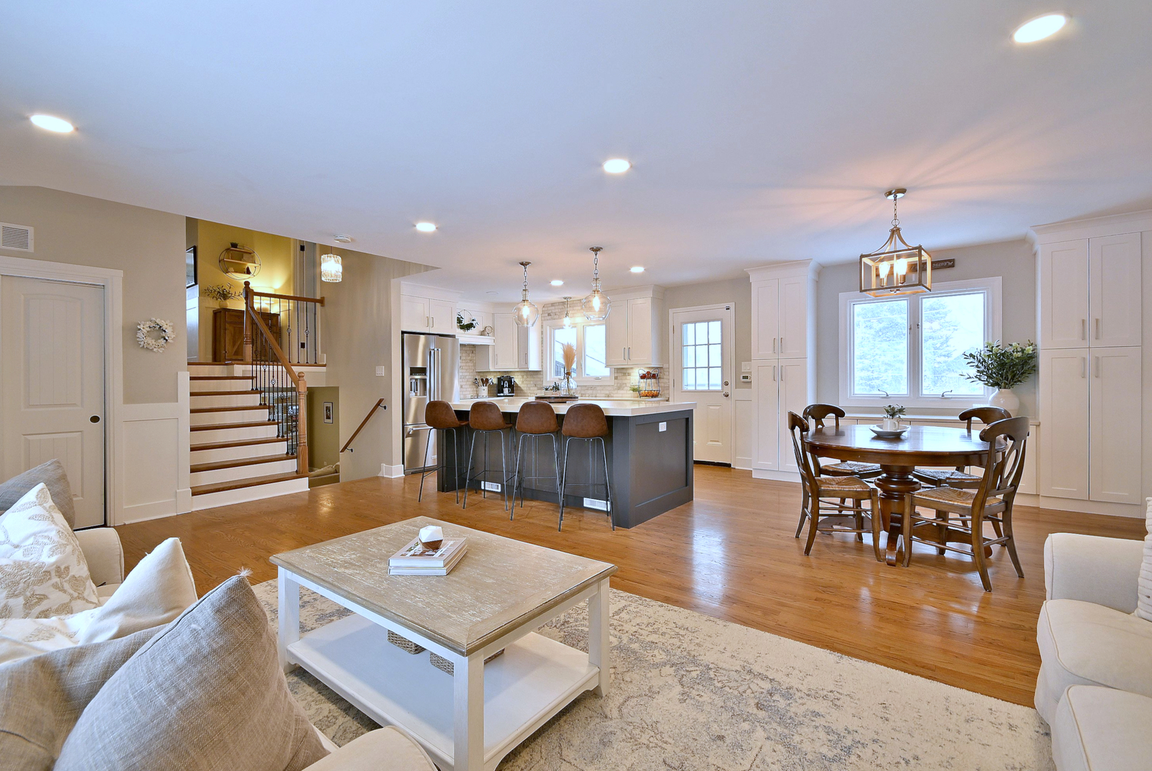 366 Marion Street Elmhurst, IL 60126 - Photo 5 of 41 a living room with furniture a table and kitchen view