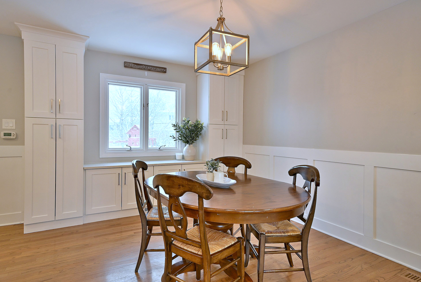 366 Marion Street Elmhurst, IL 60126 - Photo 9 of 41 a view of a dining room that has a table and chairs in it