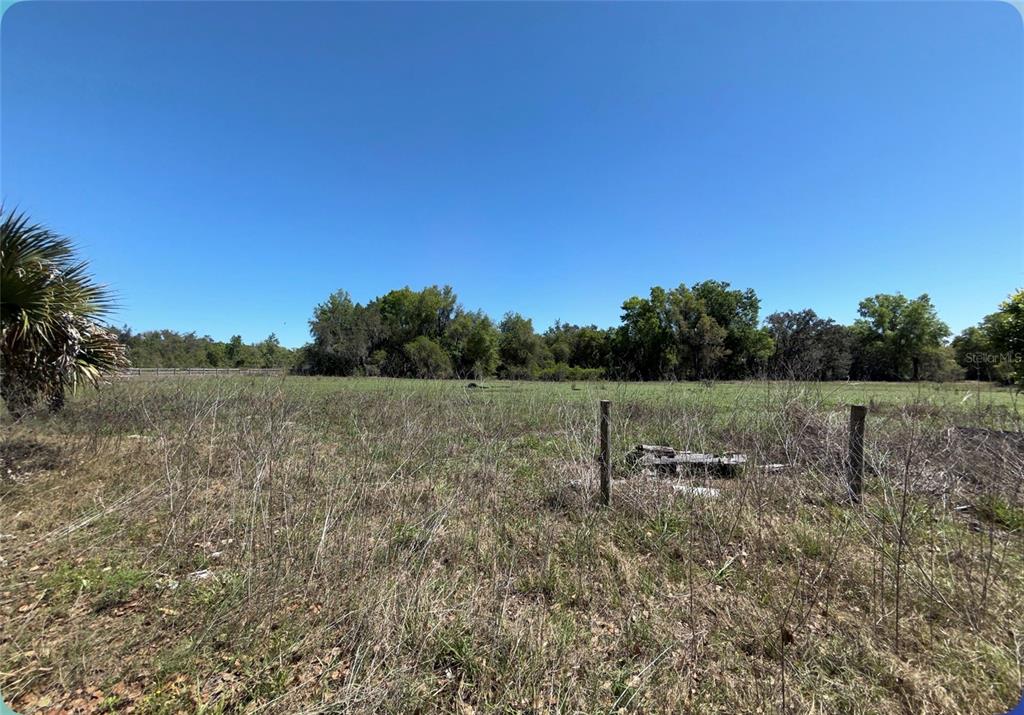 9844 Poe Street Leesburg, FL 34788 - Photo 17 of 32 a view of a outdoor space