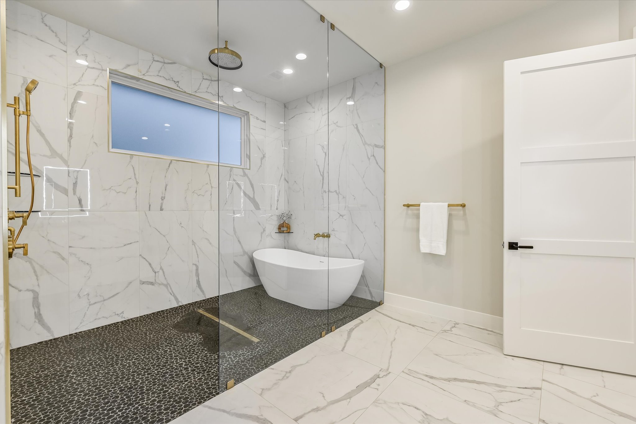 410 Shady Tree Drive Georgetown, TX 78633 - Photo 14 of 40 Bathroom with a marble finish shower, recessed lighting, light marble finish floors, and a freestanding bath