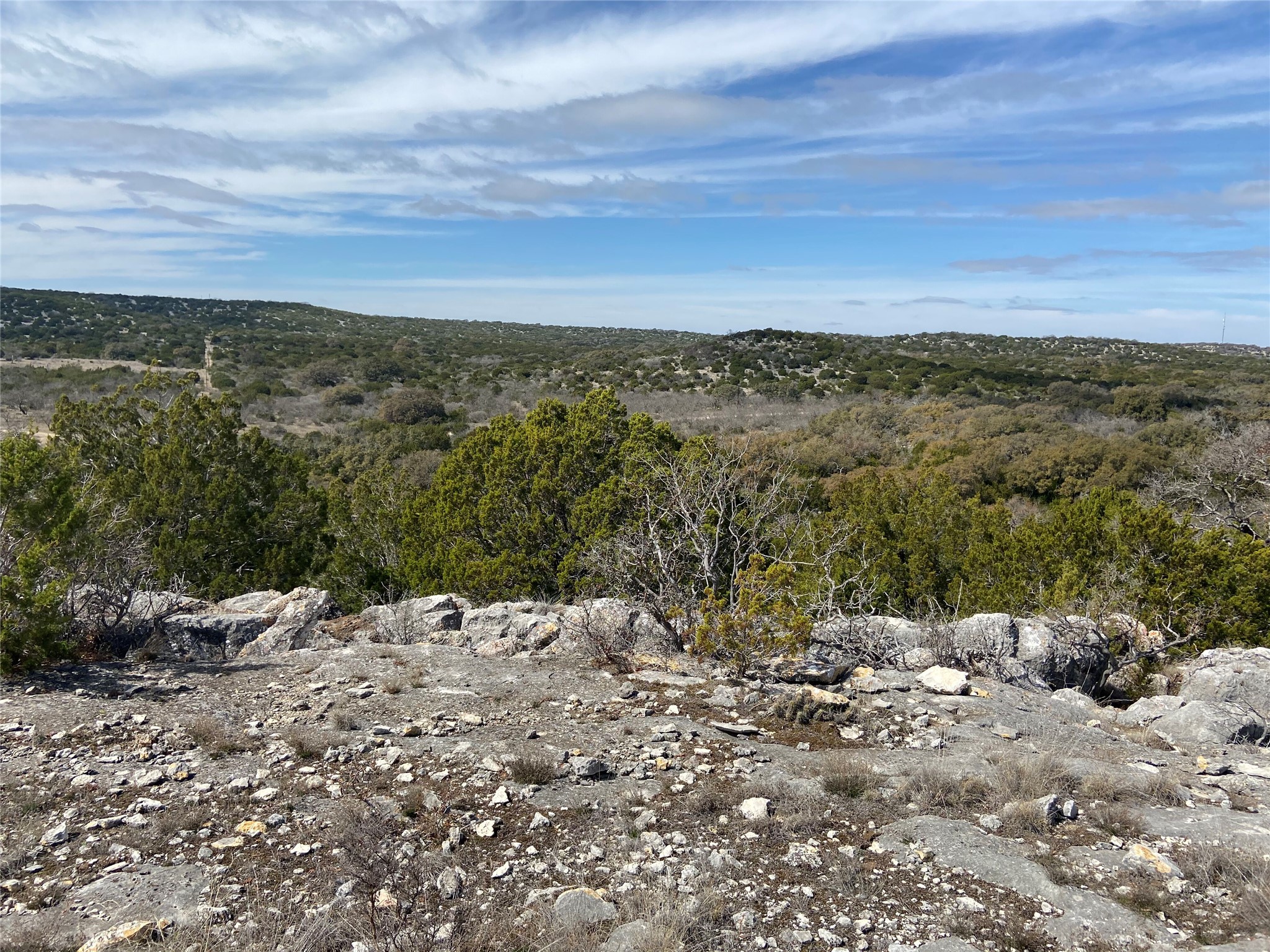 450 County Road 450 Rocksprings, TX 78880 - Photo 9 of 22 a view of a large mountain with mountains in the background