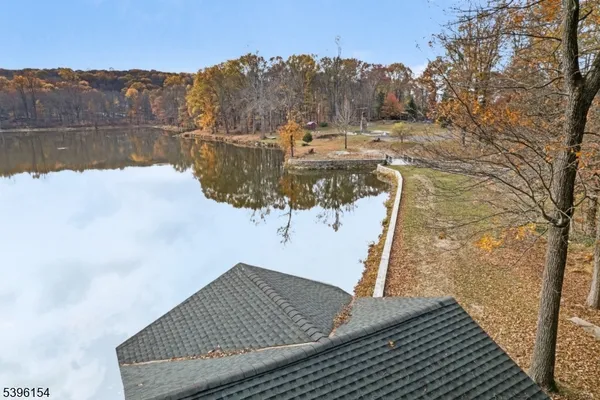 a view of swimming pool from a lake