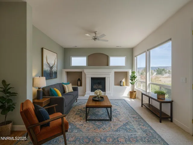 an empty room with closet and a ceiling fan