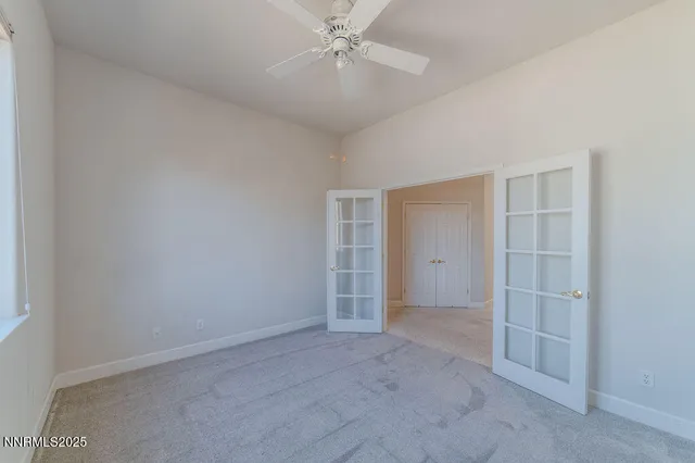 a bathroom with a sink double vanity and a mirror