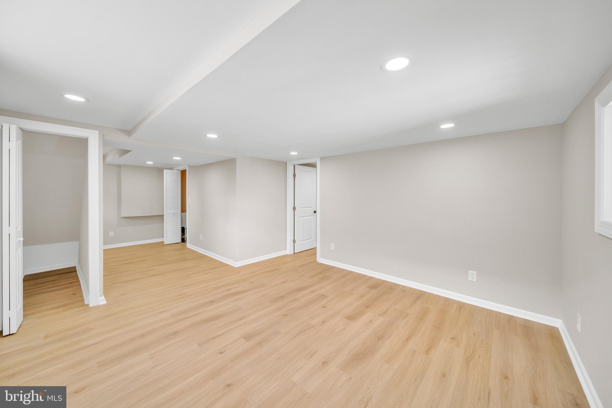 6018 2nd Street Northwest Washington, DC 20011 - Photo 14 of 18 a view of an empty room with wooden floor