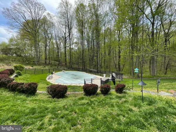 a garden view with a sitting space