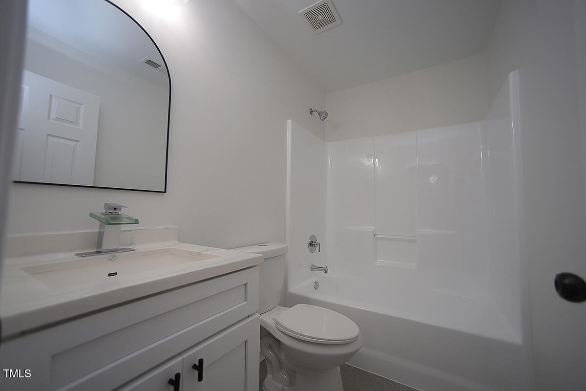 3244 Marcony Way Raleigh, NC 27610 - Photo 26 of 30 Hall Full Bathroom ( upstairs)