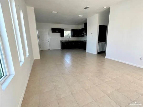 a view of a kitchen with a sink