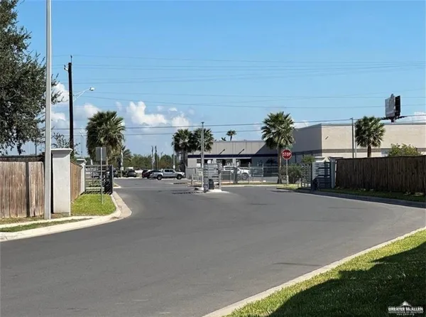 a view of a street with cars