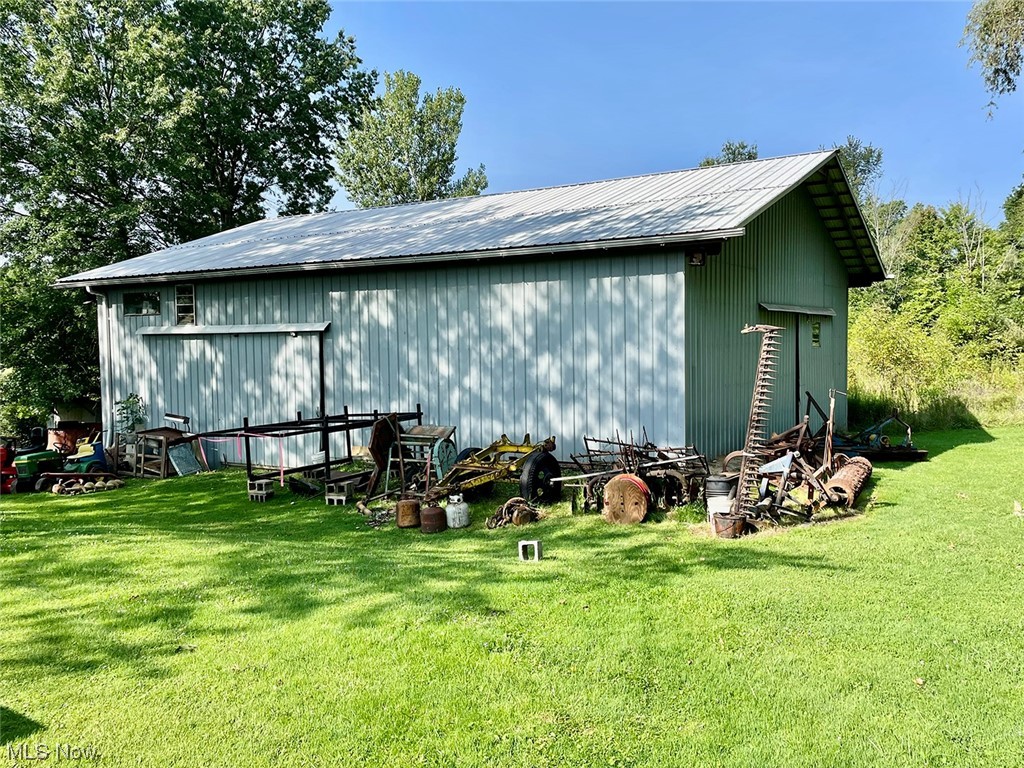 3371 Biltz Road Kent, OH 44240 - Photo 2 of 8 View of outbuilding / structure featuring a lawn