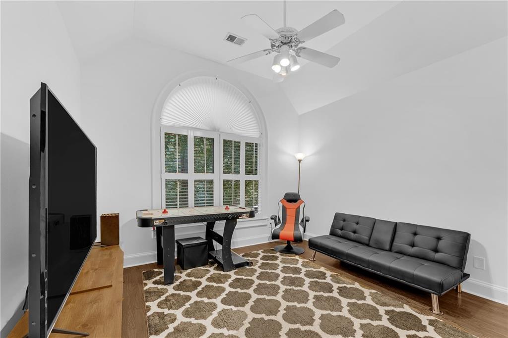 411 Chelsea Circle Northeast Atlanta, GA 30307 - Photo 27 of 42 a living room with furniture and a window