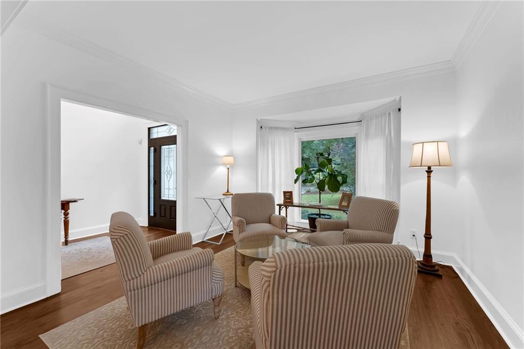 411 Chelsea Circle Northeast Atlanta, GA 30307 - Photo 8 of 42 a living room with furniture and a lamp