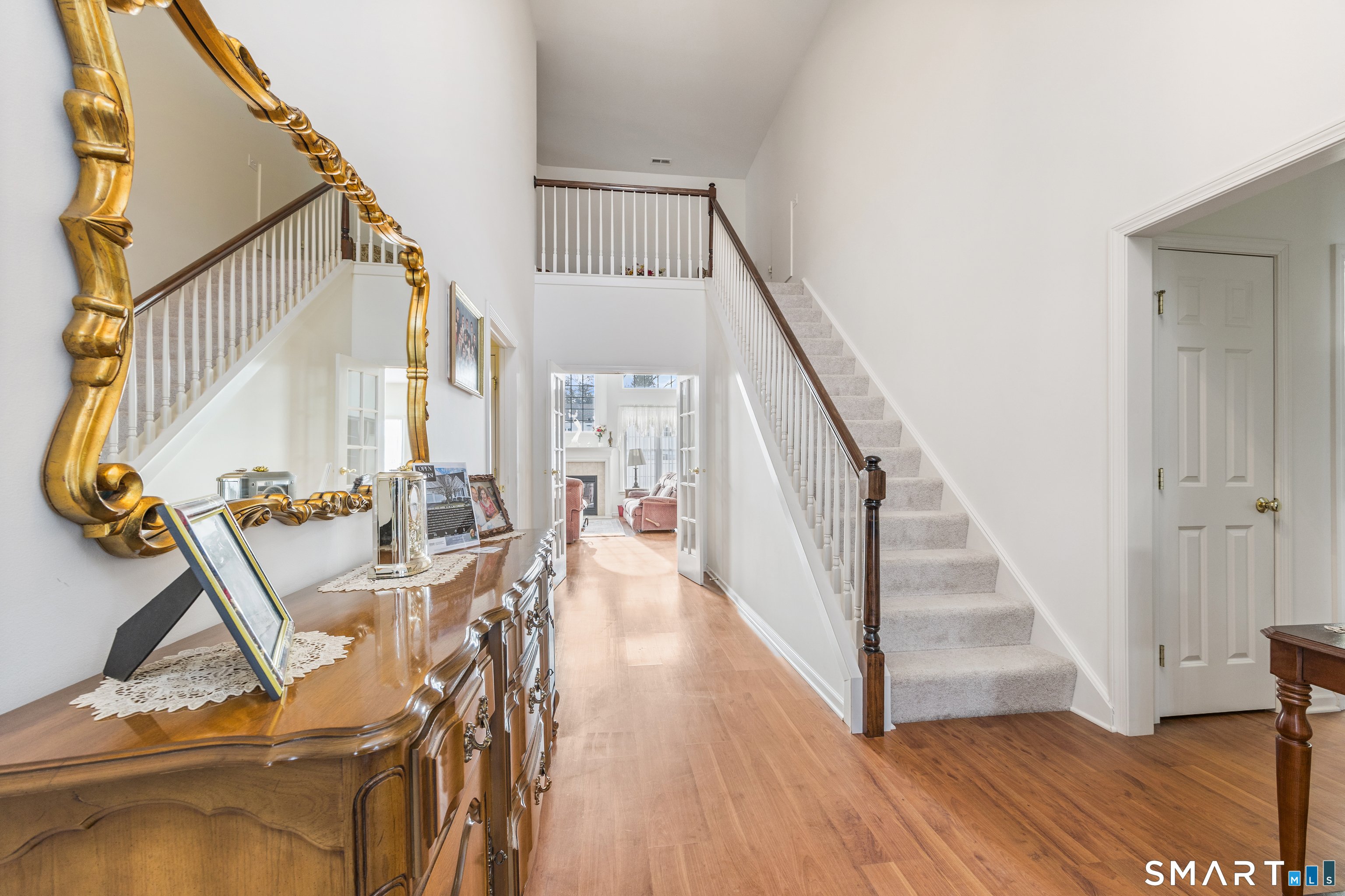 39 Phillips Farm Road, Unit 39 East Hartford, CT 06118 - Photo 12 of 32 a view of entryway with wooden floor