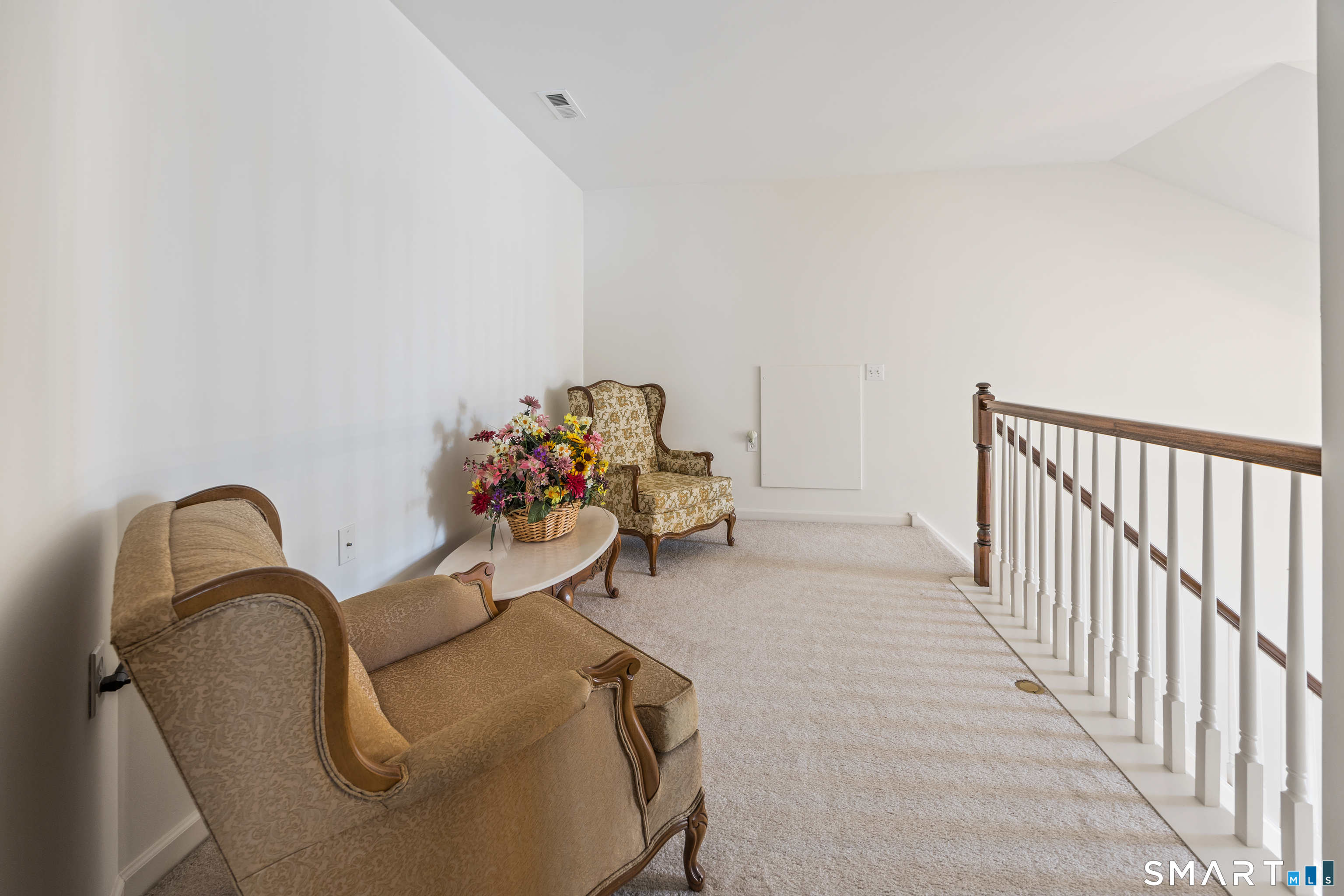 39 Phillips Farm Road, Unit 39 East Hartford, CT 06118 - Photo 23 of 32 a dining room with furniture