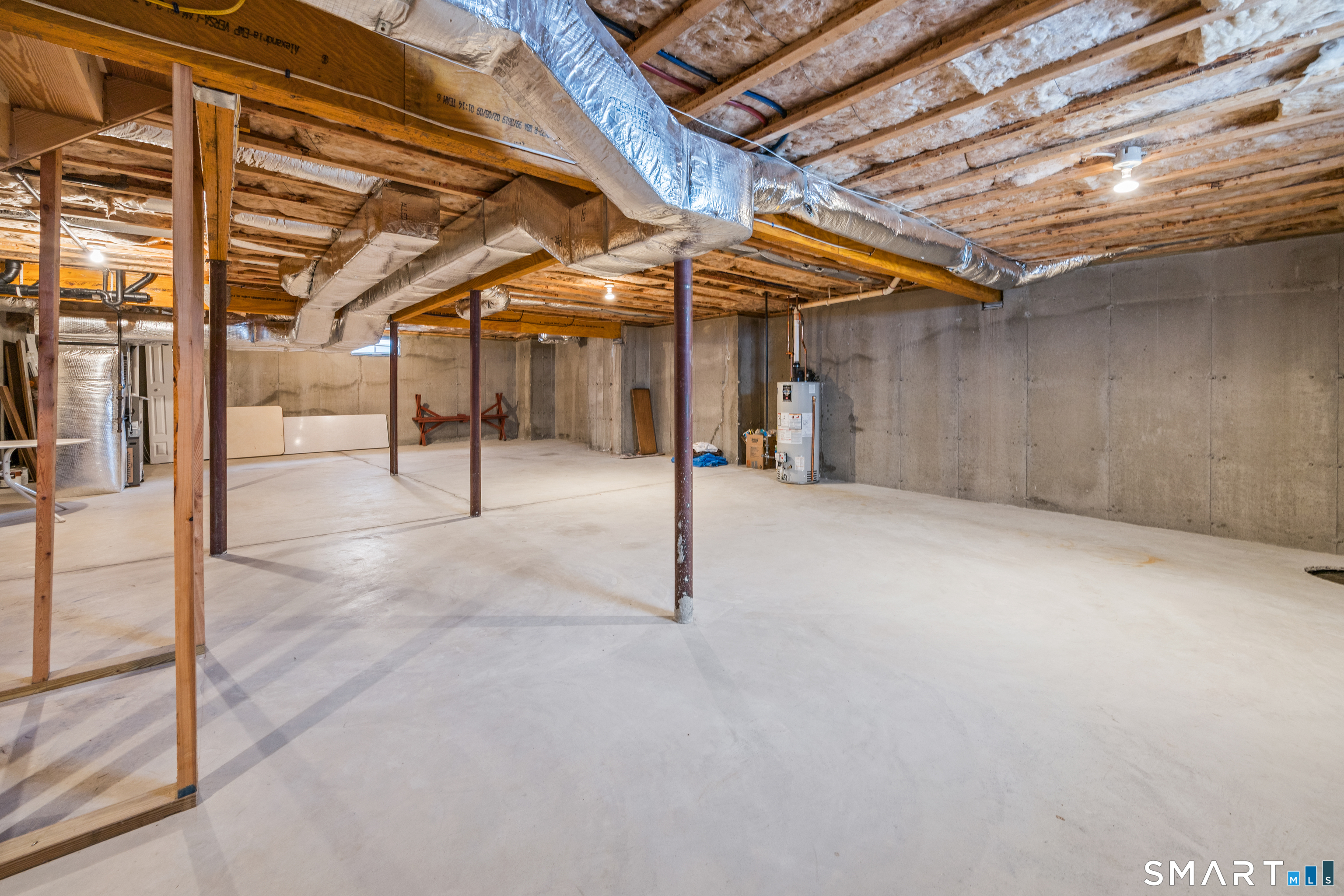 39 Phillips Farm Road, Unit 39 East Hartford, CT 06118 - Photo 24 of 32 a view of a indoor garage