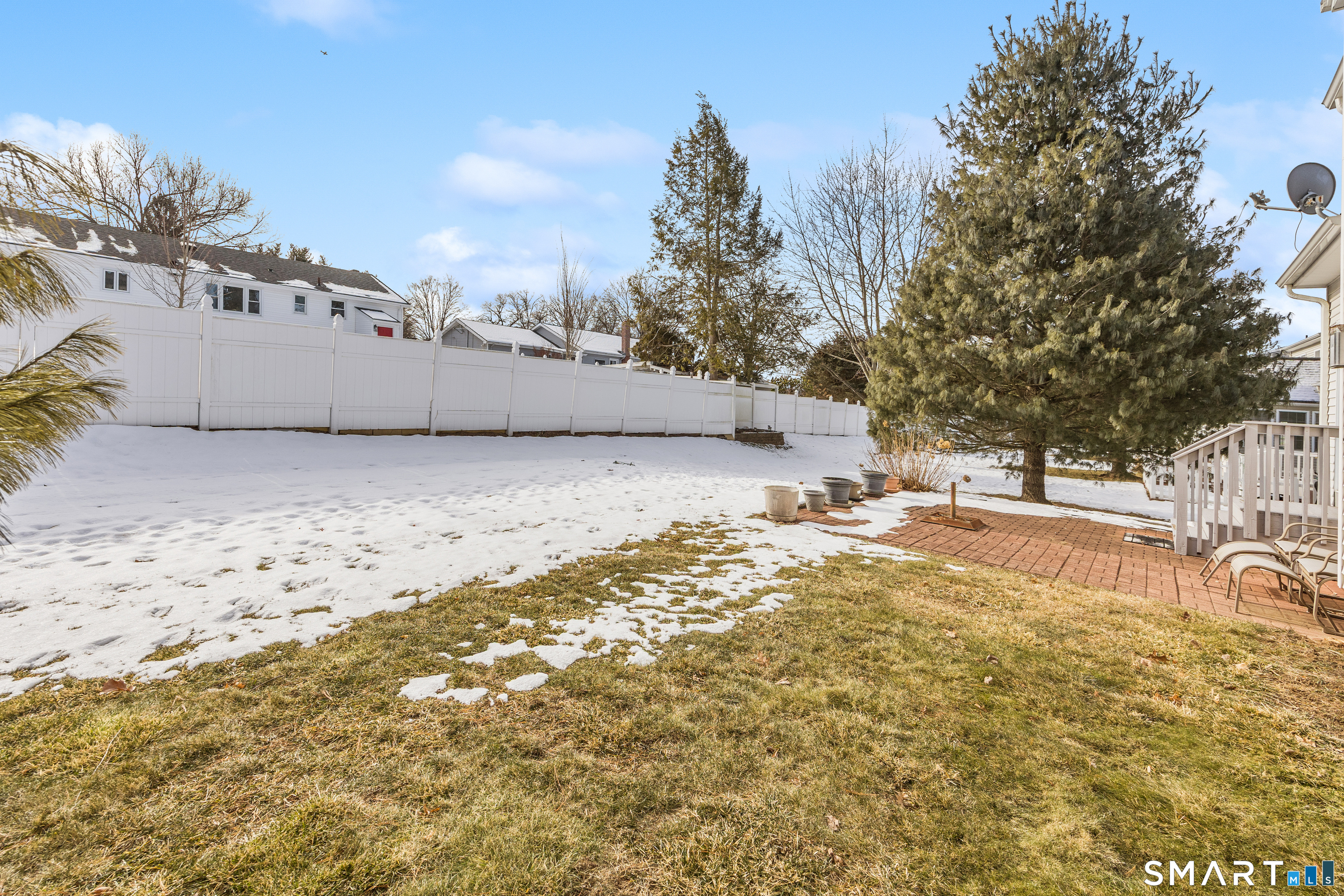 39 Phillips Farm Road, Unit 39 East Hartford, CT 06118 - Photo 26 of 32 a view of yard with trees in the background