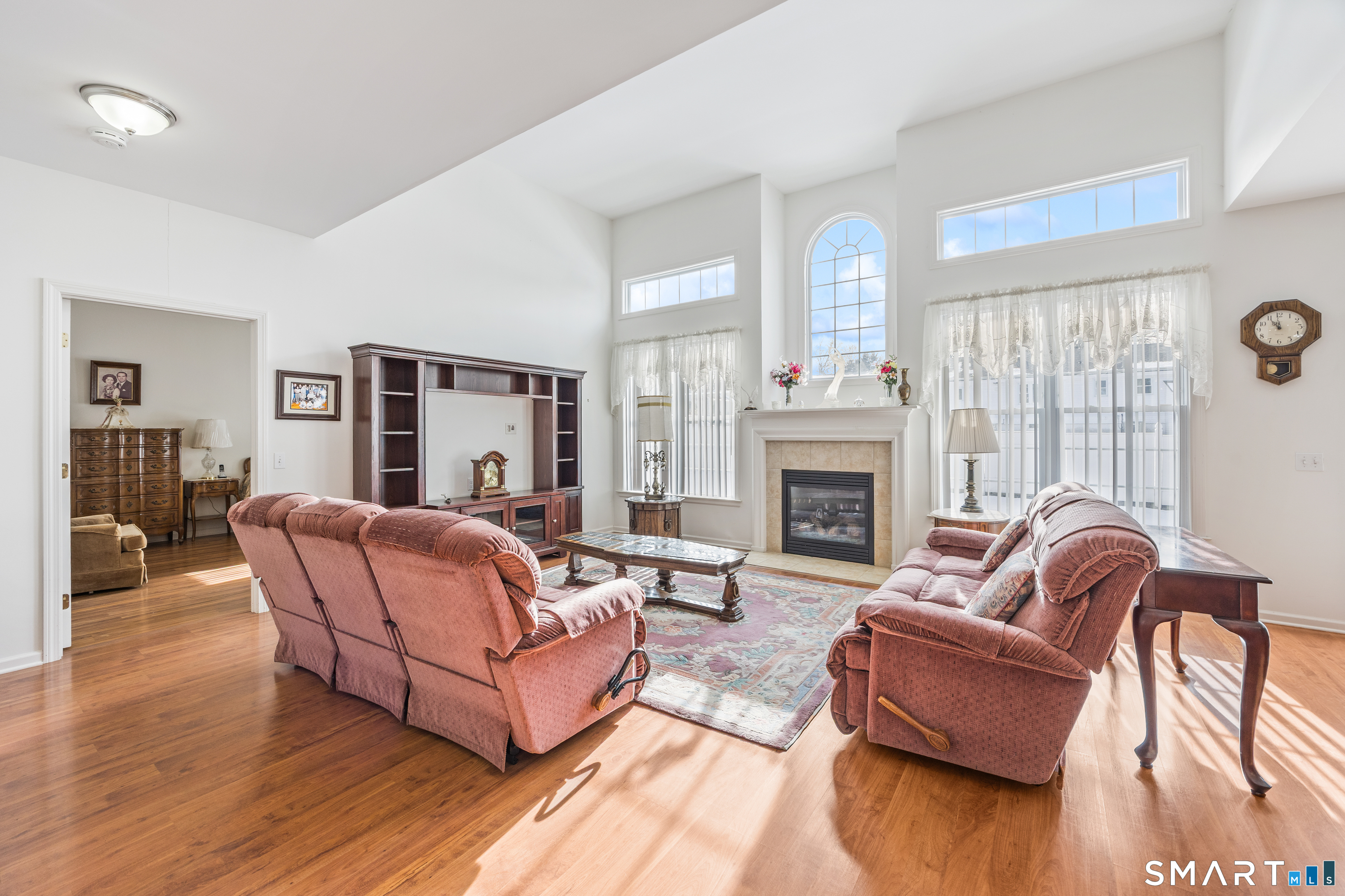 39 Phillips Farm Road, Unit 39 East Hartford, CT 06118 - Photo 6 of 32 a living room with furniture or fireplace and a window