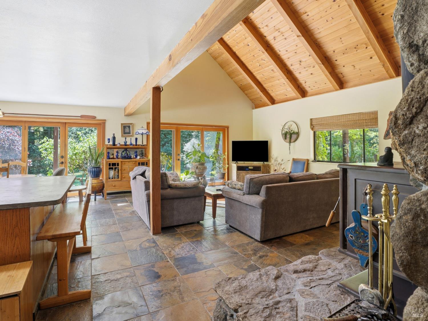 31397 Seaview Road Cazadero, CA 95421 - Photo 8 of 47 a living room with furniture and a flat screen tv