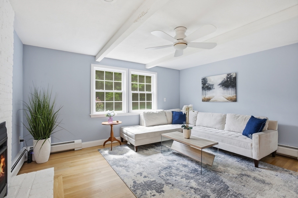 94 Johnson Road Winchester, MA 01890 - Photo 11 of 40 a living room with furniture and a large window