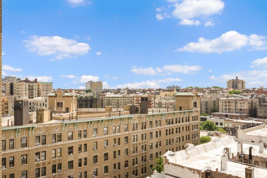 790 Riverside Drive, Unit 12K Manhattan, NY 10032 - Photo 3 of 11 a view of a city with tall buildings