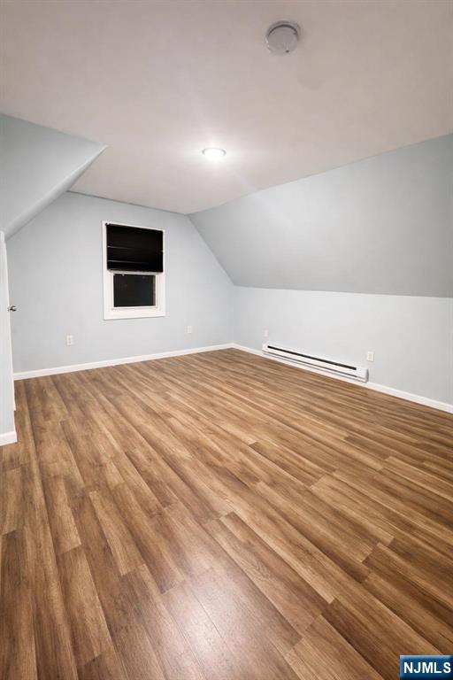 100 Rosa Parks Boulevard, Unit 3 Paterson, NJ 07501 - Photo 3 of 9 a view of empty room with wooden floor