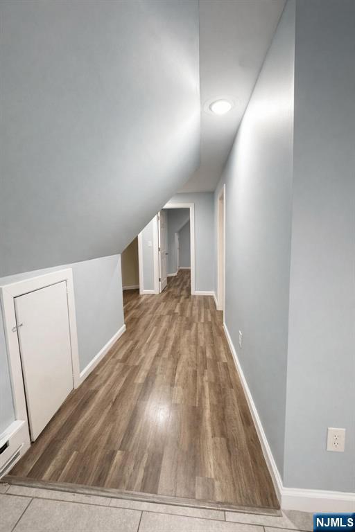 100 Rosa Parks Boulevard, Unit 3 Paterson, NJ 07501 - Photo 5 of 9 a view of a livingroom with wooden floor