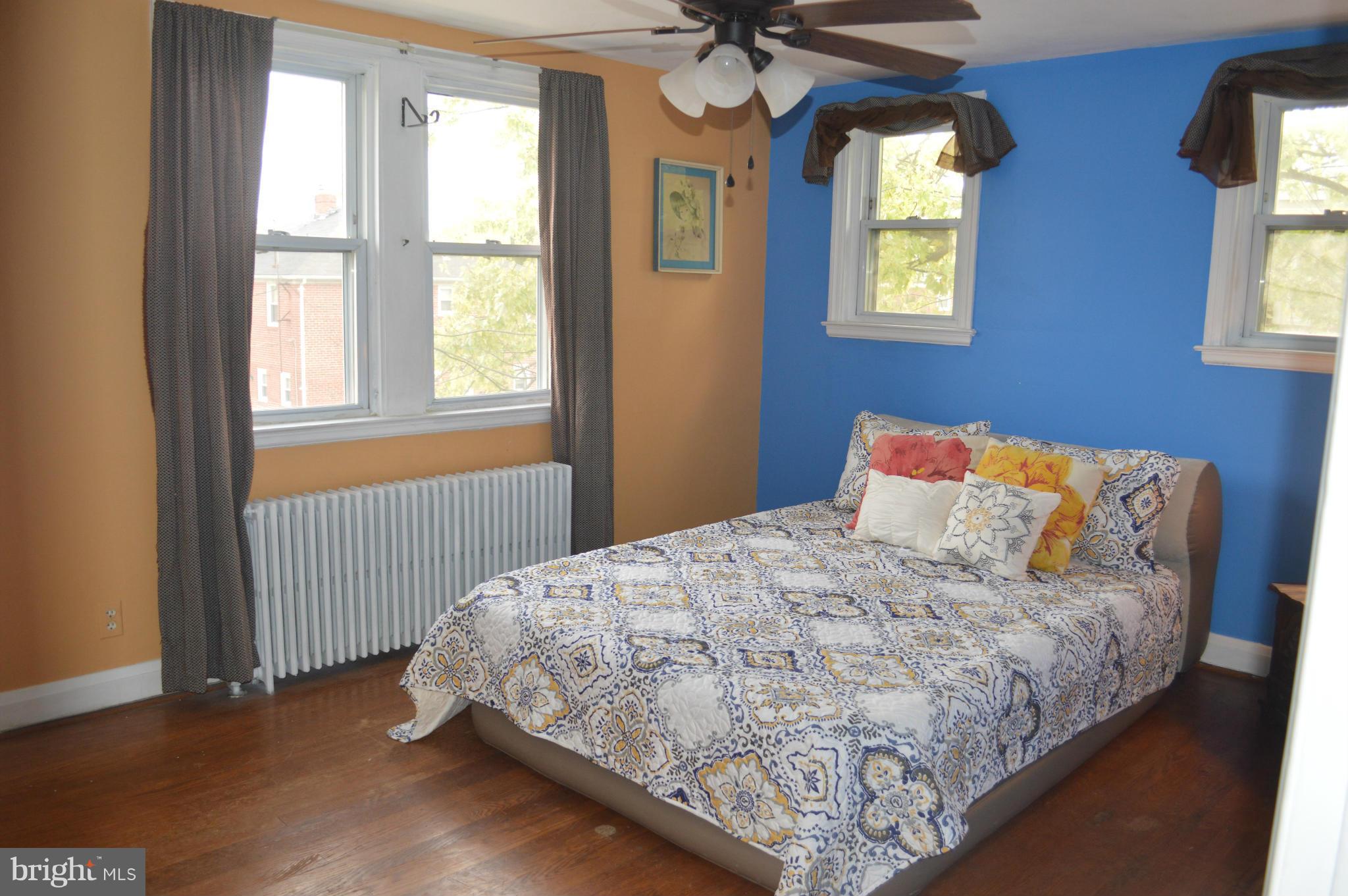 746 Charing Cross Road Baltimore, MD 21229 - Photo 14 of 30 a bedroom with a bed and window
