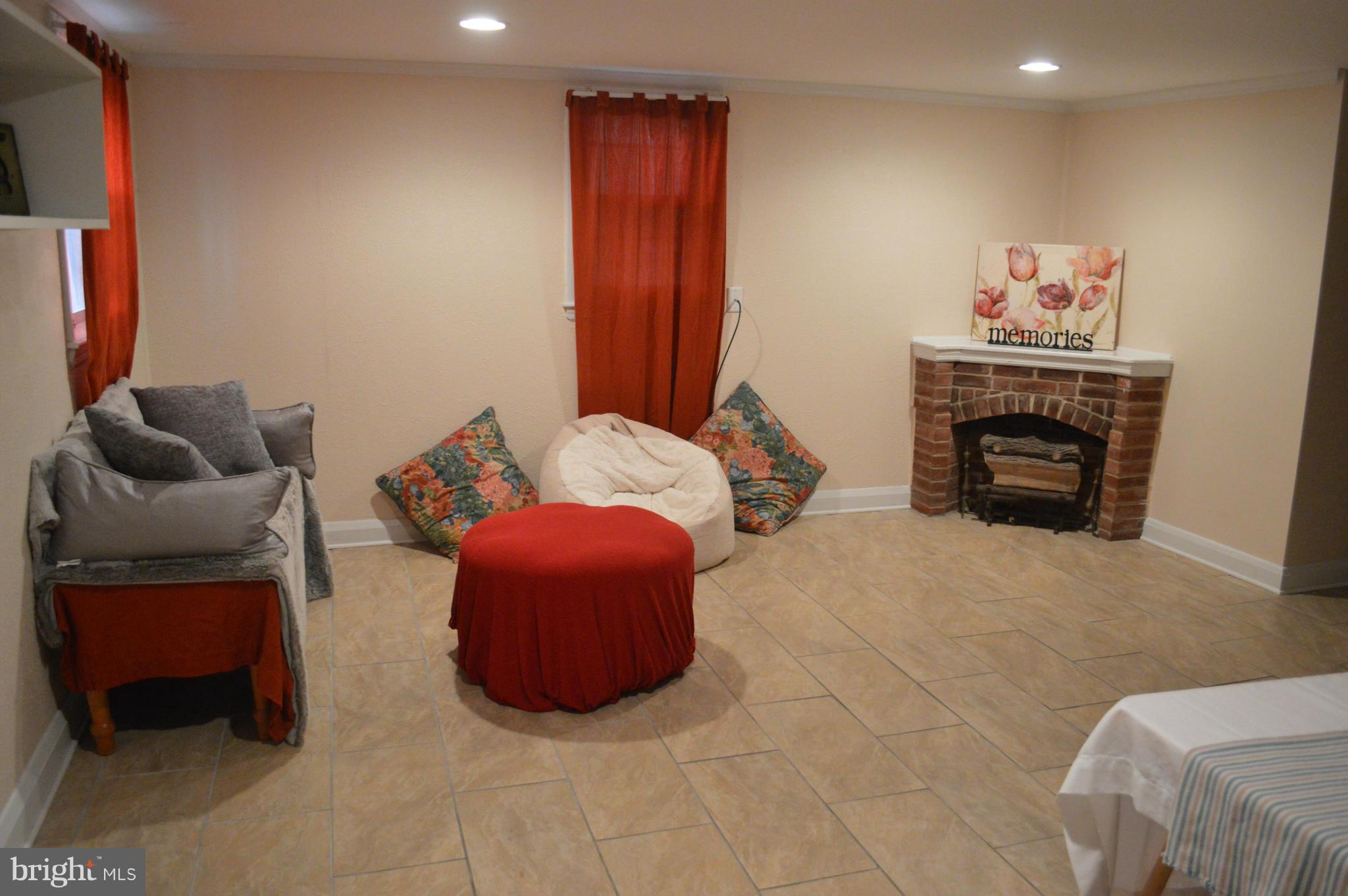 746 Charing Cross Road Baltimore, MD 21229 - Photo 18 of 30 a bedroom with a bed and a couch