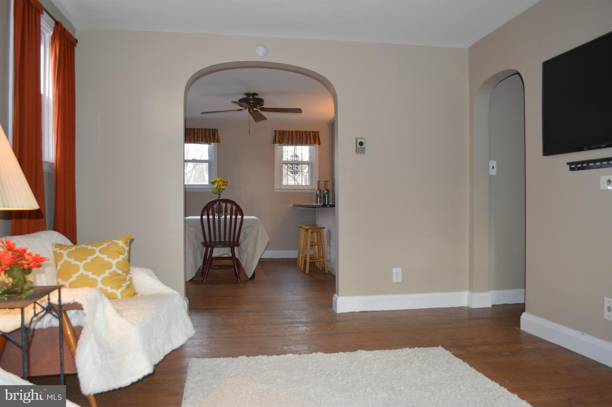 746 Charing Cross Road Baltimore, MD 21229 - Photo 2 of 30 a living room with furniture and a window