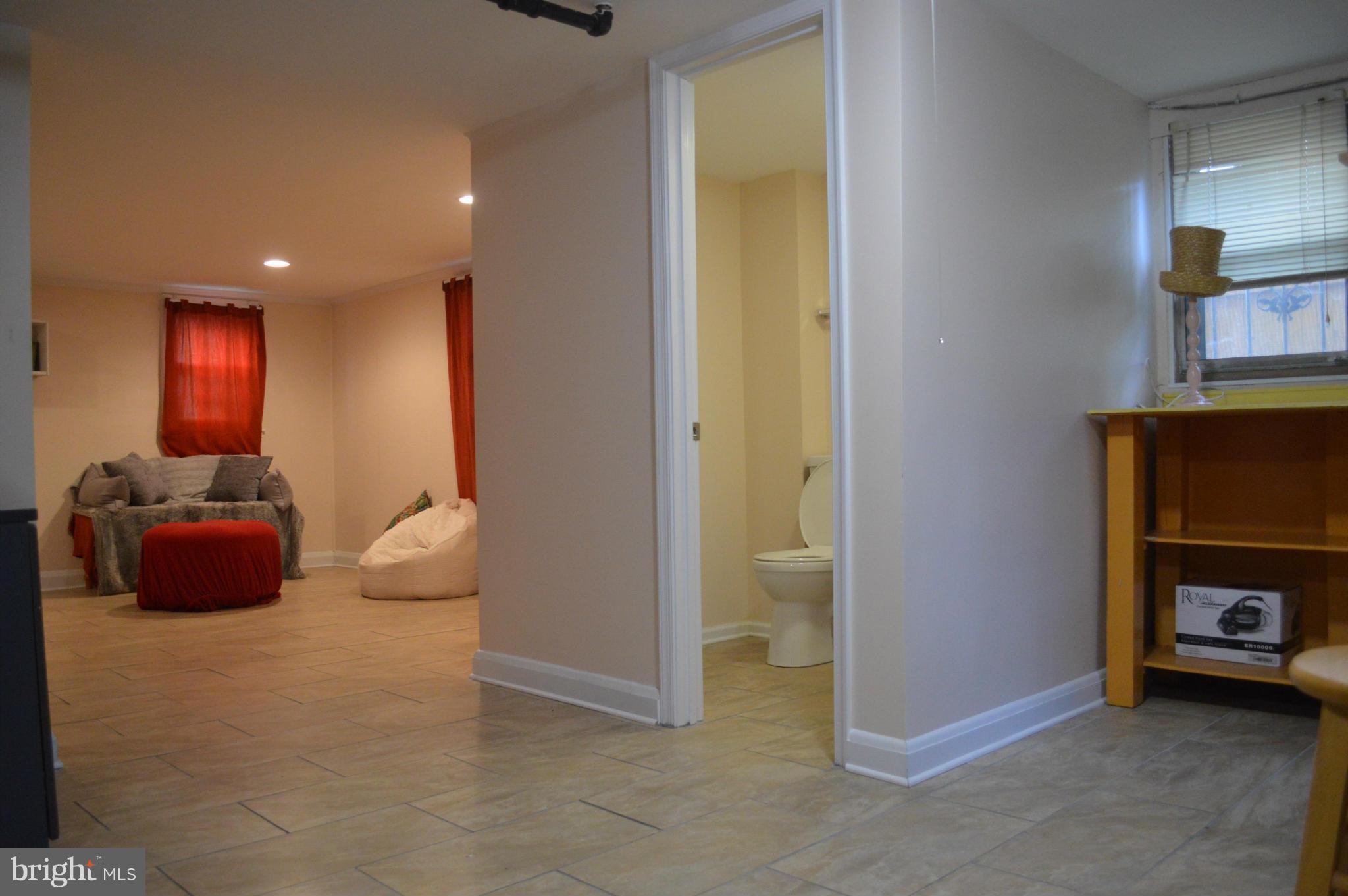 746 Charing Cross Road Baltimore, MD 21229 - Photo 23 of 30 a view of livingroom with furniture and a fireplace