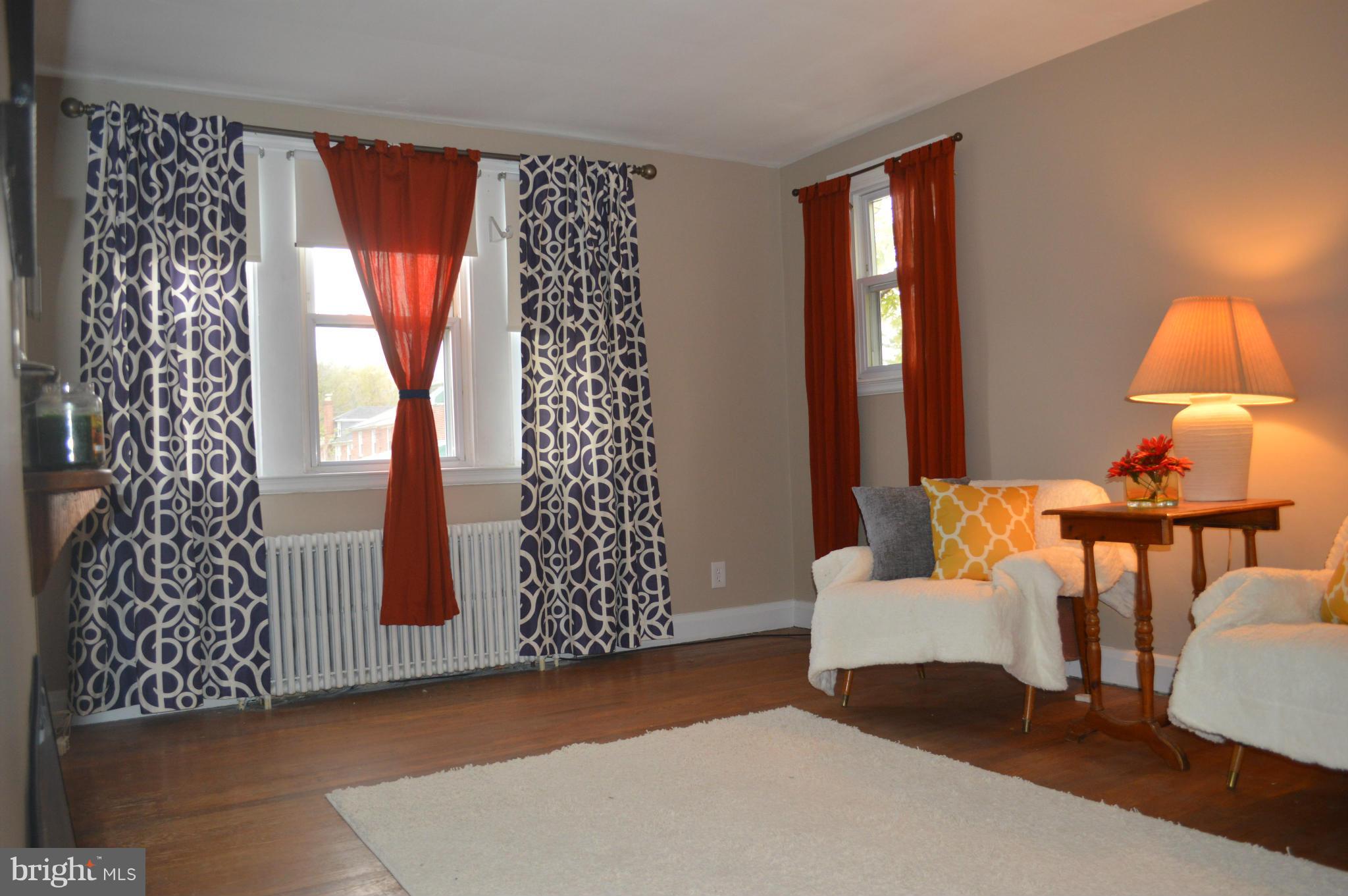 746 Charing Cross Road Baltimore, MD 21229 - Photo 5 of 30 a bedroom with a bed and a window