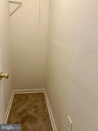 a swimming pool with outdoor seating and yard