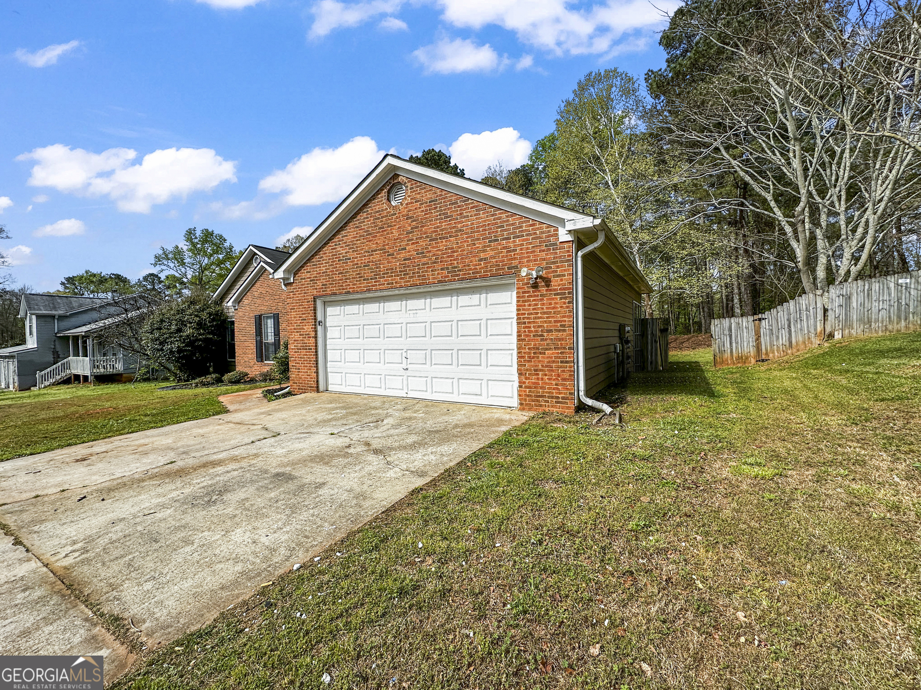 11647 Matthews Trail Hampton, GA 30228 - Photo 2 of 18 a view of a house with a yard