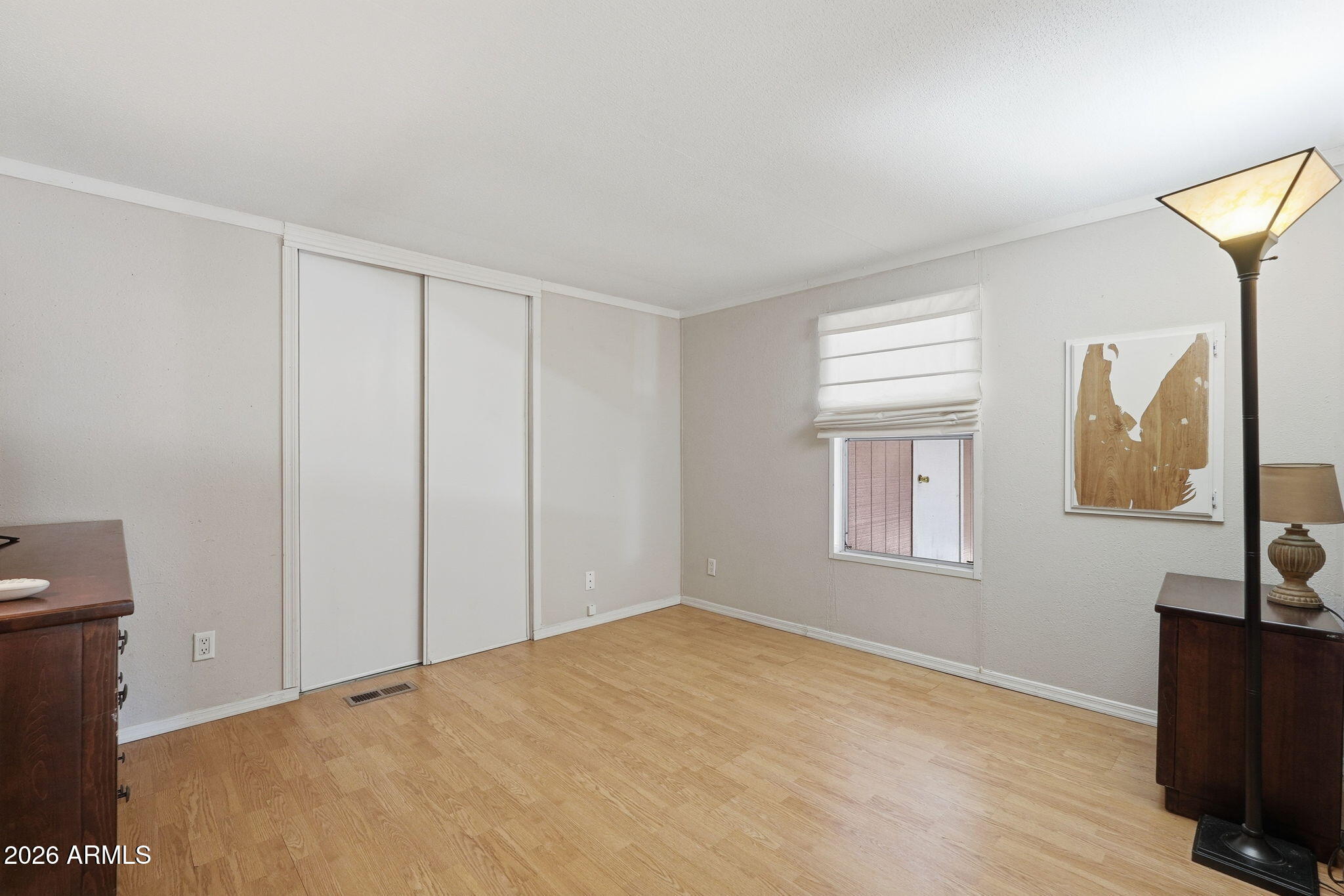 53 North Mountain Road, Unit 38 Apache Junction, AZ 85120 - Photo 24 of 35 a view of an empty room with a window