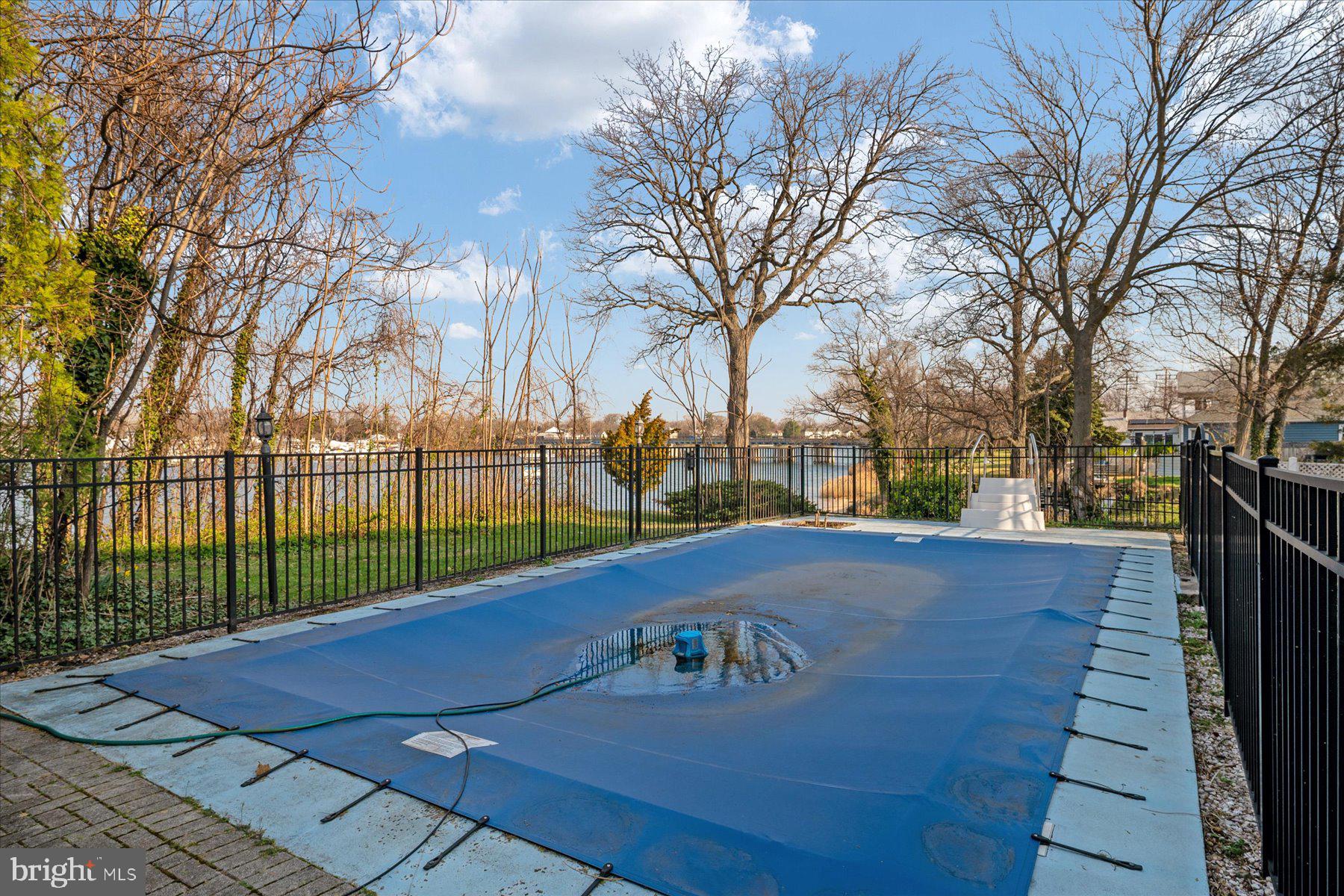 20 Granada Road Pasadena, MD 21122 - Photo 54 of 56 Tranquil poolside retreat awaits spring.
