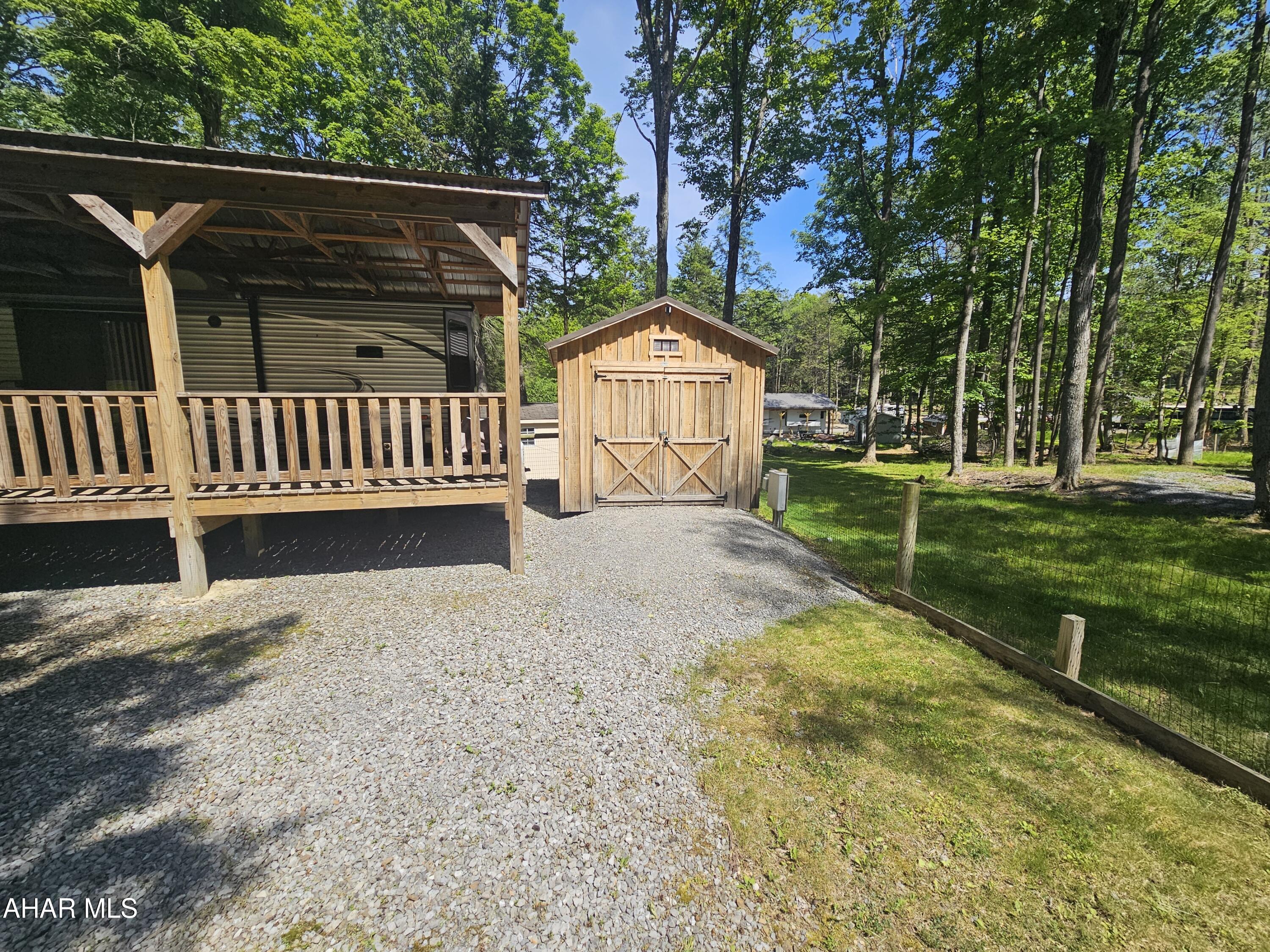 137 Mimosa Circle Flinton, PA 16640 - Photo 3 of 18 a view of backyard with green space
