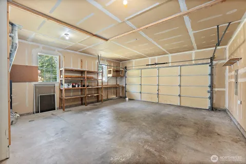 a view of a garage with furniture