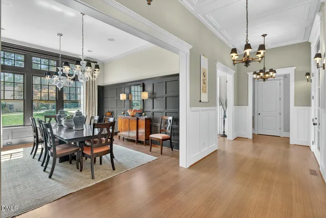 a living room with furniture a wooden floor and a window