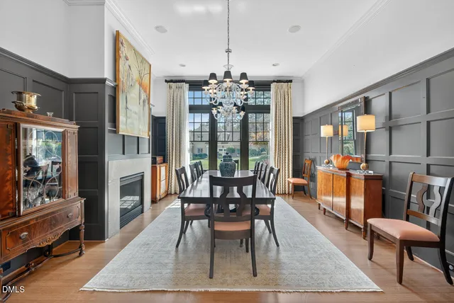 a dining room with furniture window wooden floor