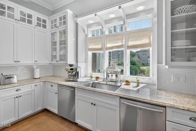 a bathroom with a mirror and a shower