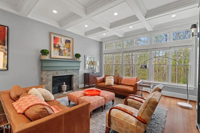 a spacious bathroom with a double vanity sink a mirror and a shower