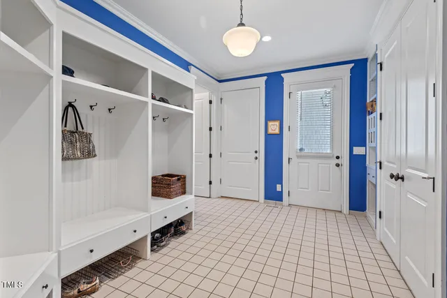 a kitchen with stainless steel appliances granite countertop a sink and cabinets with wooden floors
