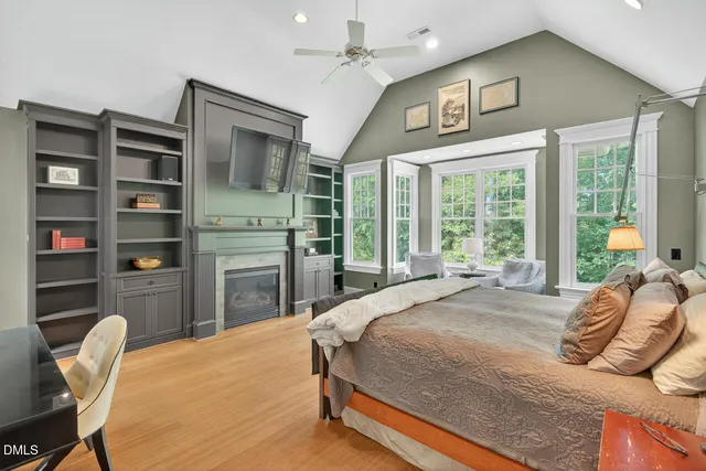 a bathroom with a sink a large mirror and vanity