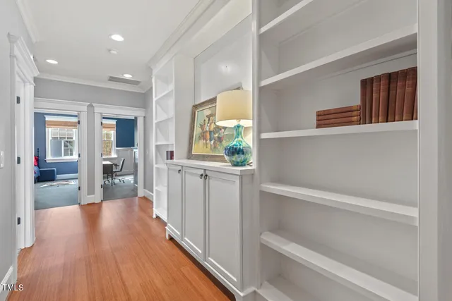 a view of a patio with couches chairs and a fireplace