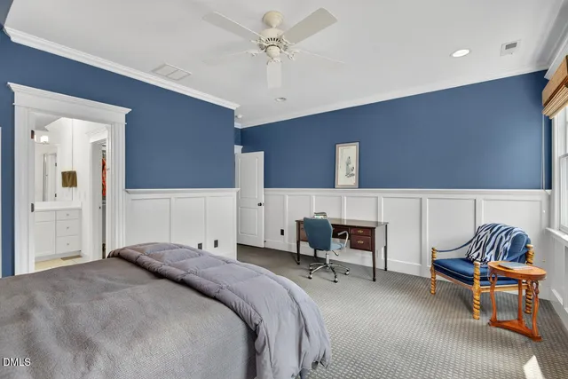 an aerial view of a house with outdoor space