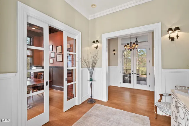 a kitchen with a sink a stove and cabinets
