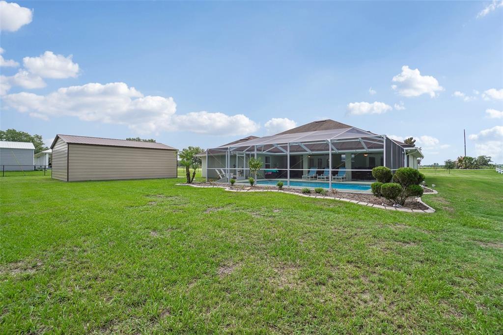 3934 Connersville Road Bartow, FL 33830 - Photo 55 of 81 a view of a house with a backyard